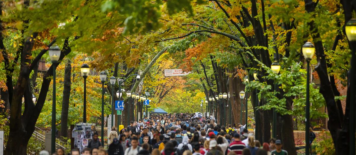 Locust Walk in Fall, busy with students